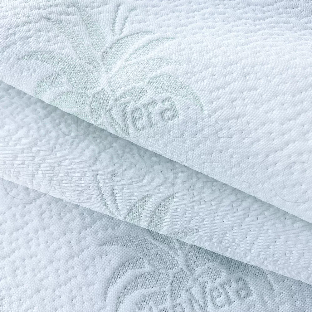 Трикотажное полотно ALOE VERA 19-light green FS белого цвета с тематическим светло-зеленым рисунком