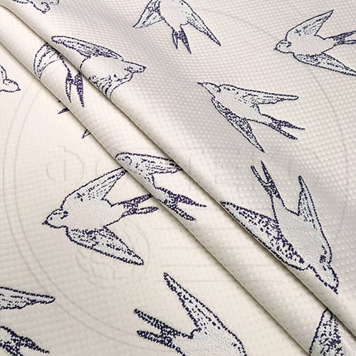 Трикотажное полотно FRTX 25 034 Ласточка белого цвета с фиолетовым рисунком